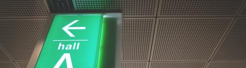 Exhibition hall sign in green and white