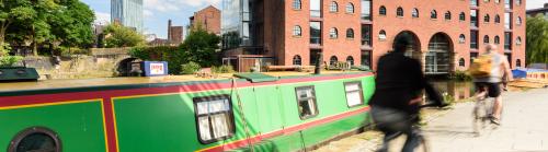 Bikers cycling along Castlefield Basin